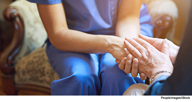 Two women holding hands