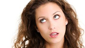 Photo of woman rolling her eyes