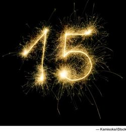 Photo of large 15 in sparkly lights.