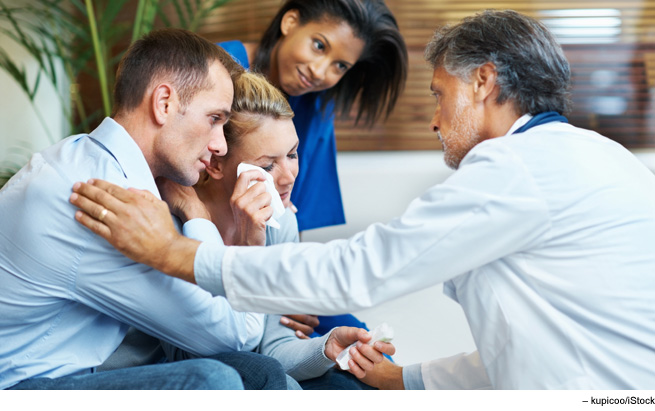 Drawing the line between hope and false expectations Doctor comforting family