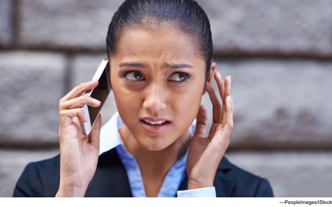 Photo of woman talking on cellphone.