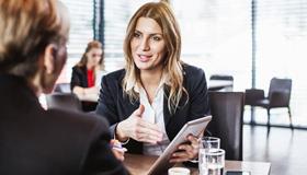 Woman talking to another person