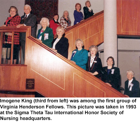 Imogene King and other Virginia Henderson Fellows.
