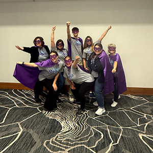 Trivia Night Team in purple capes.